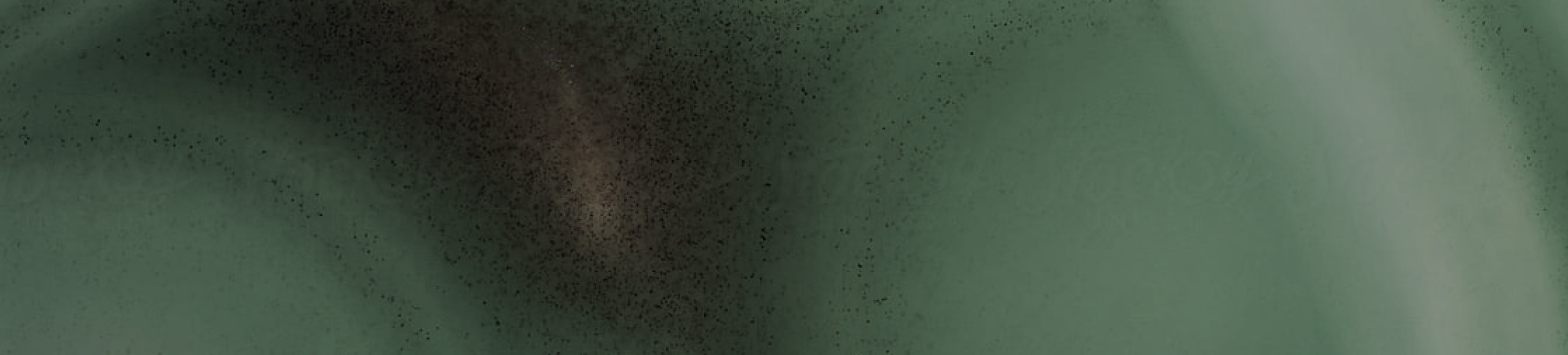 Textural green abstract gradient background